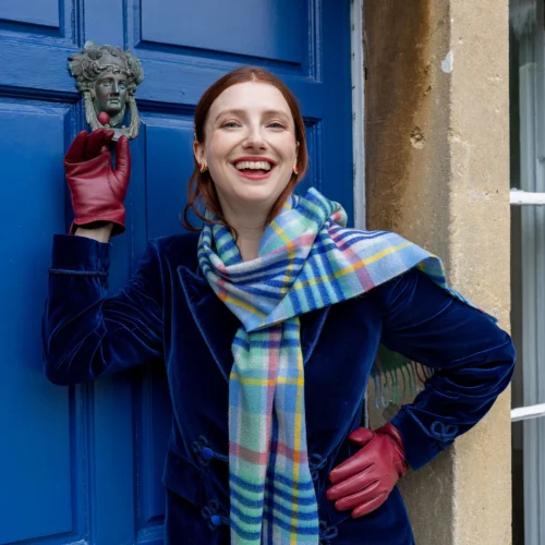 woman-wearing-touchscreen-single-gloves-wine-red